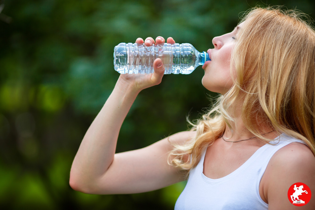 Woman Drinking Waters